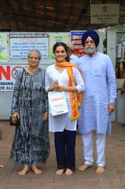 Taapsee Pannu with her parents