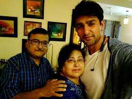 Nishant Malkani with his parents