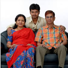 Vijay with his parents