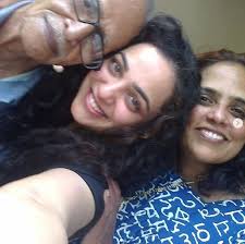 Nithya Menen with her parents
