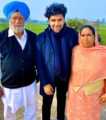 Guru Randhawa with his parents