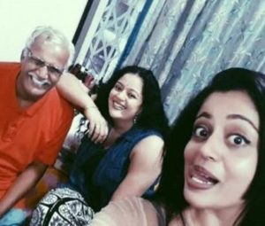 Neha Pendse with her parents