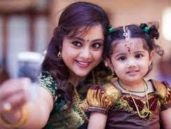 Meena with her daughter