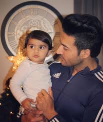 Guru Mann with his daughter