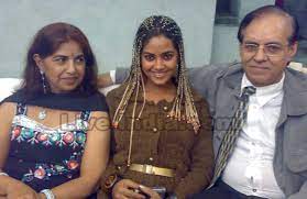 Meera Chopra with her parents