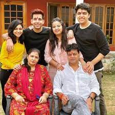 Rishi Dev with his family