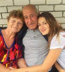 Dina Umarova with her parents