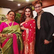 Sayantika Banerjee with her parents
